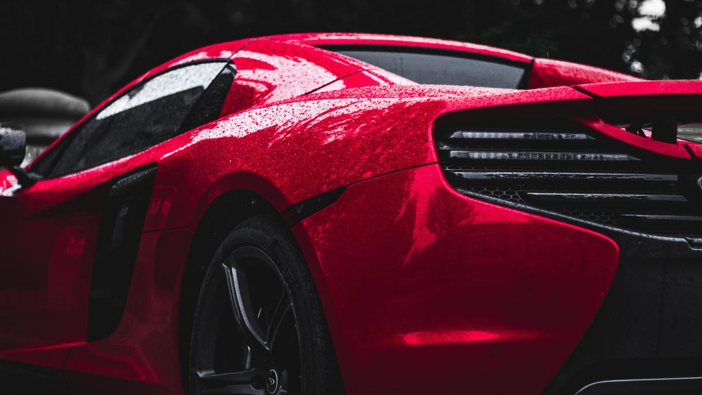 auto_sports_car_side_view_wheel_drops_119996_3840x2160.jpg