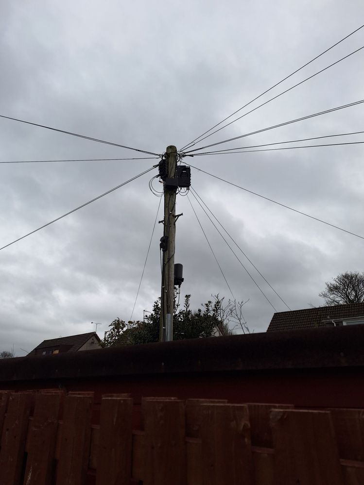 Top off the pole, larger one is VM Virgin Media, smaller is the CBT with the 3 homes connected.