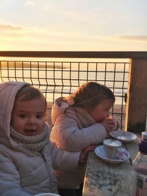 A warming babycino at the beach