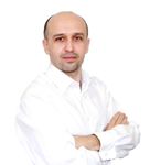 Kamil - profile 2015 - white shirt 1.1.jpg